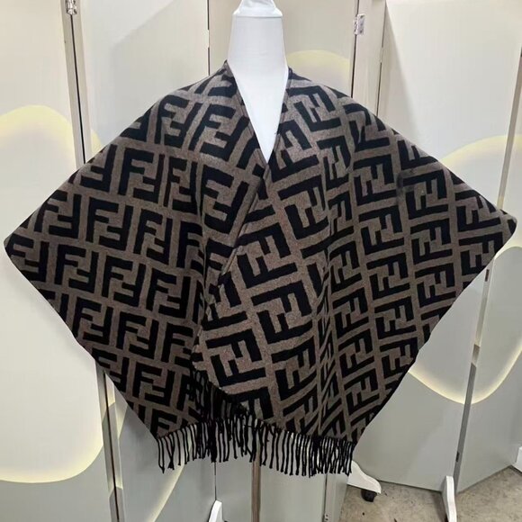 This is a Fendi shawl featuring the brand's iconic FF pattern. - Picture 1 of 8